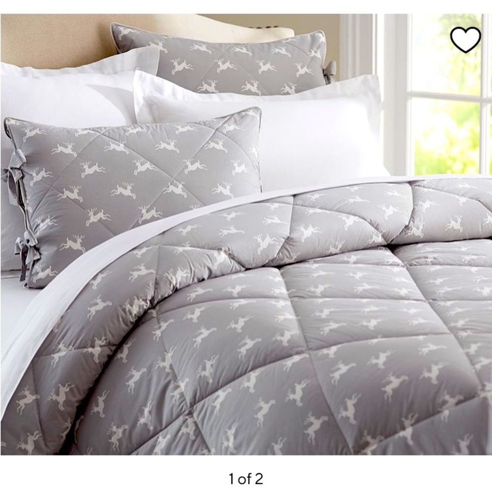 Potterybarn jumping reindeer comforter and pillowshams for full sized bed.